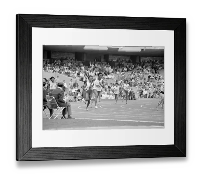Framed Print : Mildrette Netter and Myomia Tyus in Relay Framed Print : Mildrette Netter and Myomia Tyus in Relay