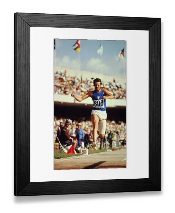 Framed Print : Giuseppe Gentile Jumping in Triple Jump Event Framed Print : Giuseppe Gentile Jumping in Triple Jump Event