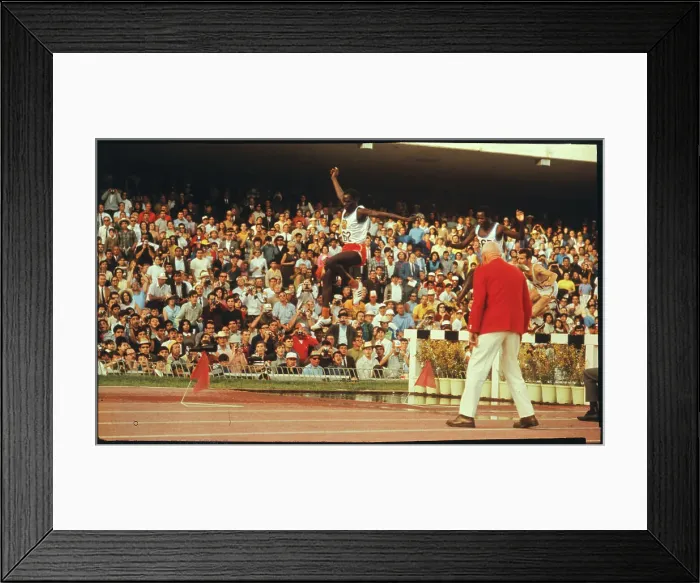 Framed Print : Amos Biwott Jumping Over a Hurdle Framed Print : Amos Biwott Jumping Over a Hurdle