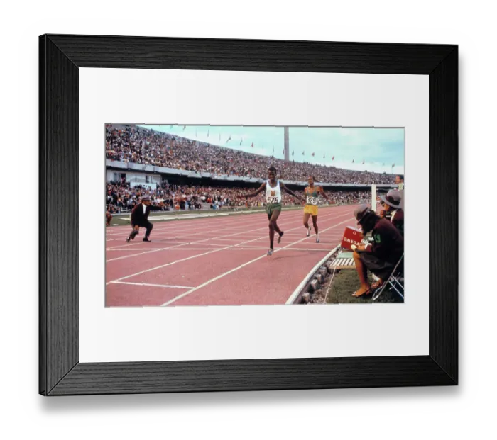 Framed Print : Naftali Temu Winning the 10, 000 Meter Run Framed Print : Naftali Temu Winning the 10, 000 Meter Run