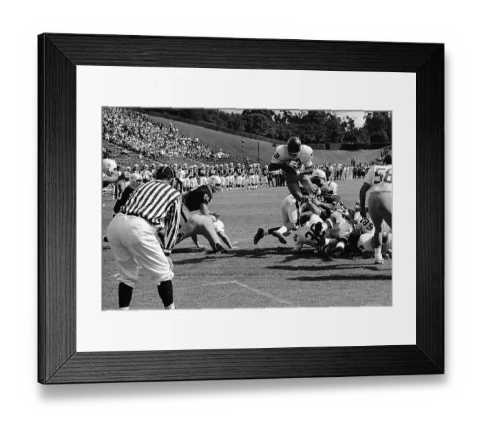 Framed Print : O.J. Simpson Jumps Over Stanford Defensive Line Framed Print : O.J. Simpson Jumps Over Stanford Defensive Line