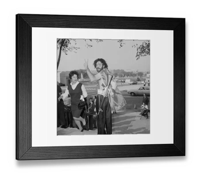 Framed Print : Jerry Rubin With Toy Machine Gun