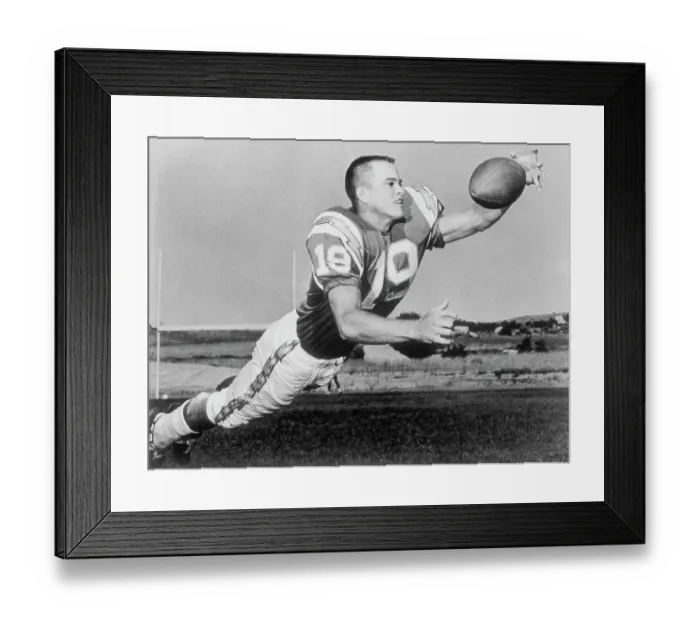 Framed Print : Lance Alworth Going up to Catch Football