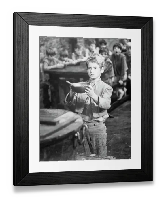 Framed Print : Mark Lester Holding a Bowl Framed Print : Mark Lester Holding a Bowl