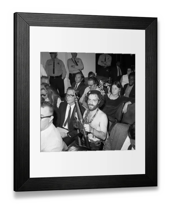 Framed Print : Bare Chested Jerry Rubin with Toy Gun Framed Print : Bare Chested Jerry Rubin with Toy Gun