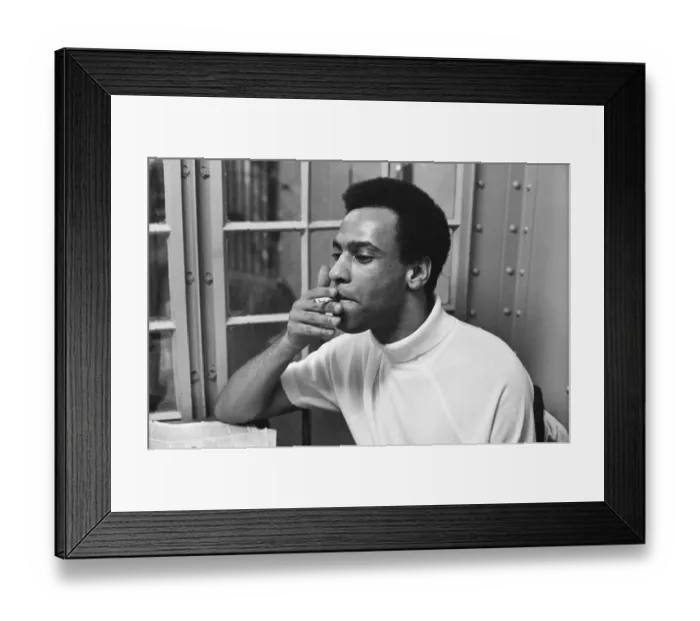 Framed Print : Huey Newton Smokes In Holding Cell Framed Print : Huey Newton Smokes In Holding Cell