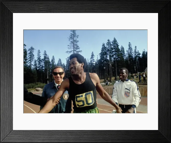 Framed Print : Lee Evans. American sprinter Lee Evans (1947 - 2021) smiling after winning Framed Print : Lee Evans. American sprinter Lee Evans (1947 - 2021) smiling after winning