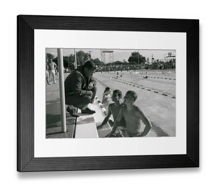 Framed Print : Coach Talking to Swim Team Framed Print : Coach Talking to Swim Team