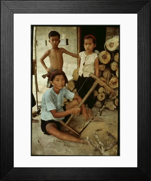 Framed Print : Family at Wood Cutting Scene Framed Print : Family at Wood Cutting Scene