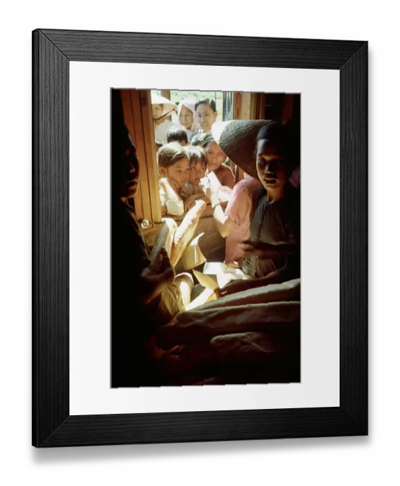 Framed Print : Vietnamese Children Crowded in a Huddle for Food Framed Print : Vietnamese Children Crowded in a Huddle for Food
