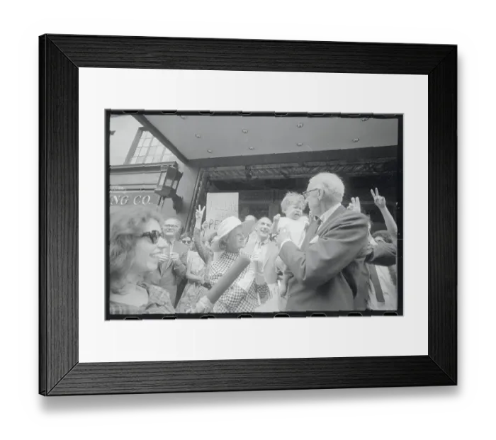 Framed Print : Dr. Benjamin Spock Holding a Baby Framed Print : Dr. Benjamin Spock Holding a Baby