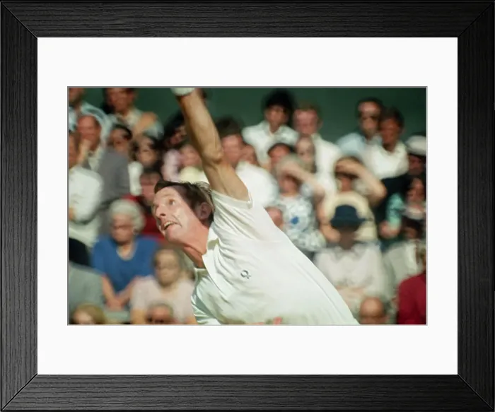 Framed Print : Rod Laver Displaying a Serve