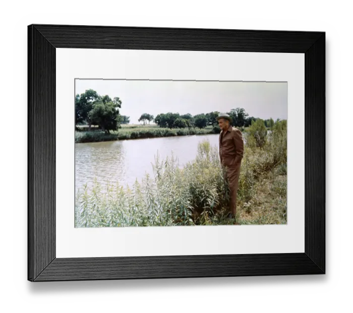 Framed Print : Lyndon B. Johnson Standing by Shoreline