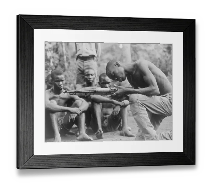 Framed Print : Ibo Tribesman Inspecting Rifle Framed Print : Ibo Tribesman Inspecting Rifle