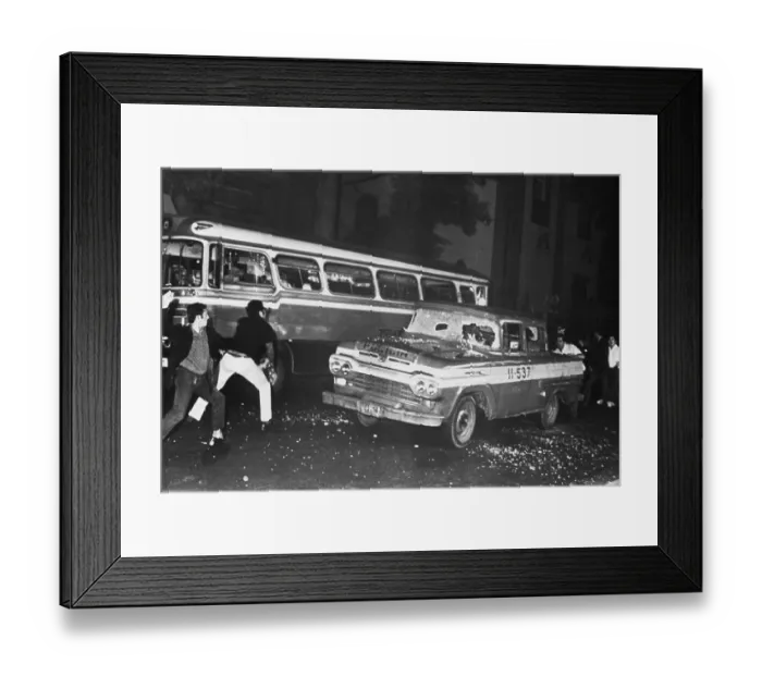 Framed Print : Students Throw Stones at Police Car Framed Print : Students Throw Stones at Police Car
