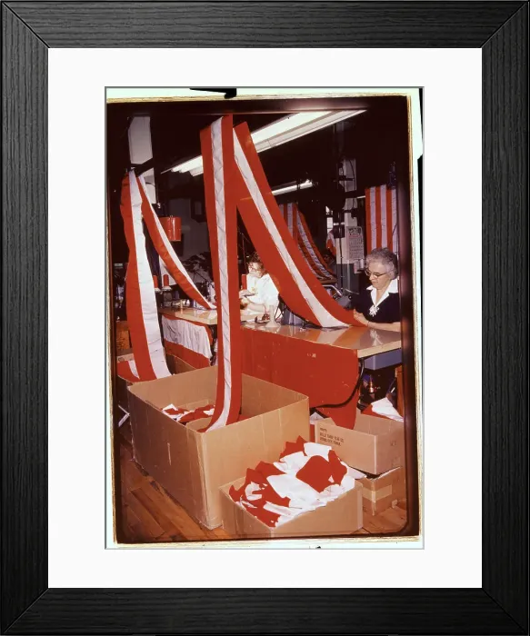 Framed Print : Woman Joining Red and White Stripes of Cloth Framed Print : Woman Joining Red and White Stripes of Cloth