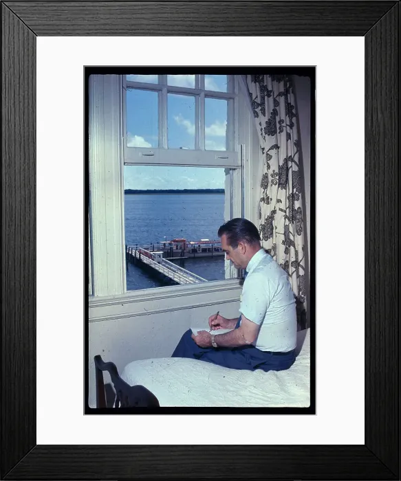 Framed Print : George C. Wallace Sitting on Bed Near Window and Writing Framed Print : George C. Wallace Sitting on Bed Near Window and Writing