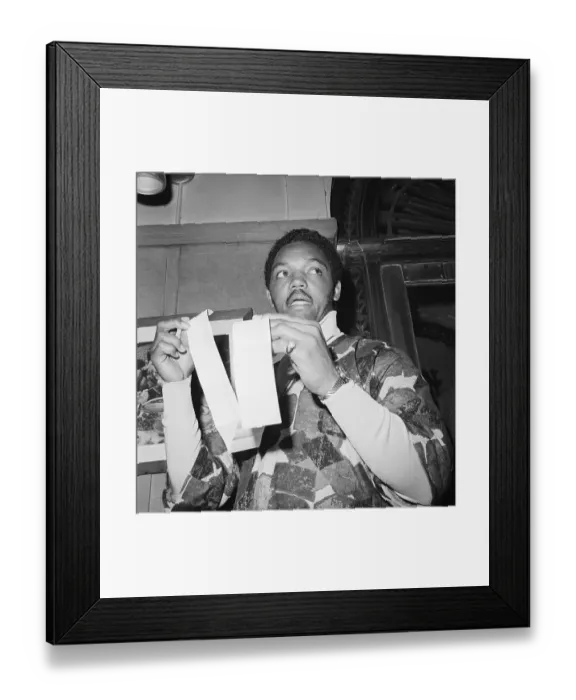 Framed Print : Reverend Jesse Jackson Holding a Receipt Framed Print : Reverend Jesse Jackson Holding a Receipt