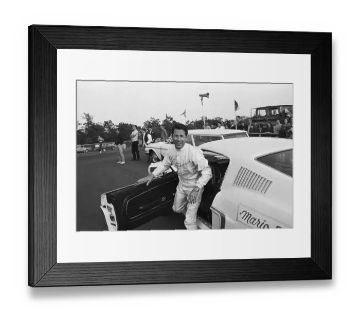 Framed Print : Mario Andretti Leaving Race Car Framed Print : Mario Andretti Leaving Race Car