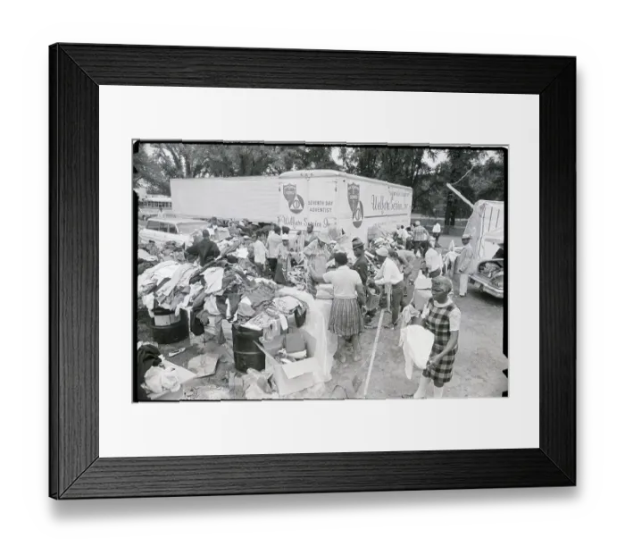 Framed Print : Tables Piled With Clothing