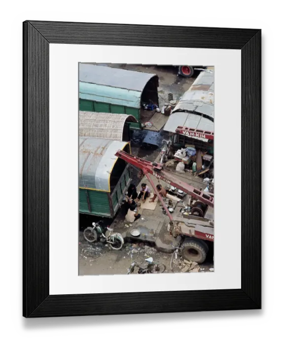 Framed Print : Refugees Sheltering Under Truck