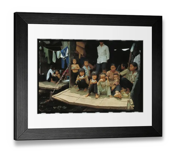 Framed Print : Vietnamese Refugees Using Truck as Shelter Framed Print : Vietnamese Refugees Using Truck as Shelter