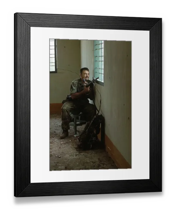Framed Print : Soldier Holding Machine Gun Framed Print : Soldier Holding Machine Gun