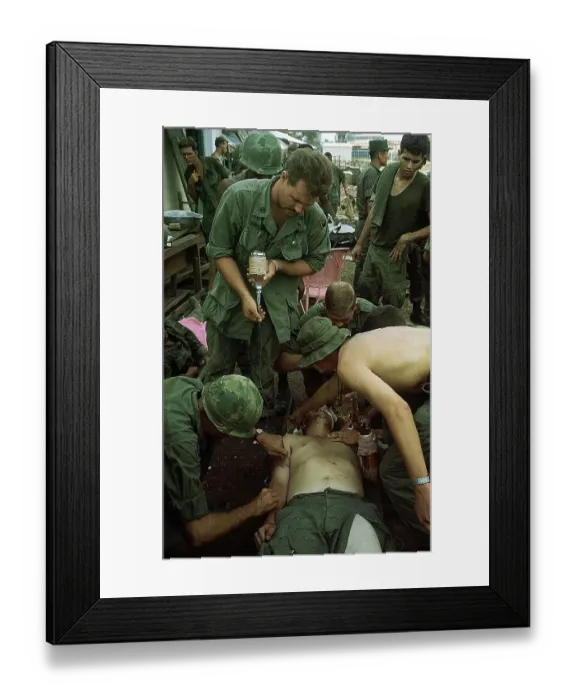 Framed Print : Wounded US Soldier Being Treated Framed Print : Wounded US Soldier Being Treated