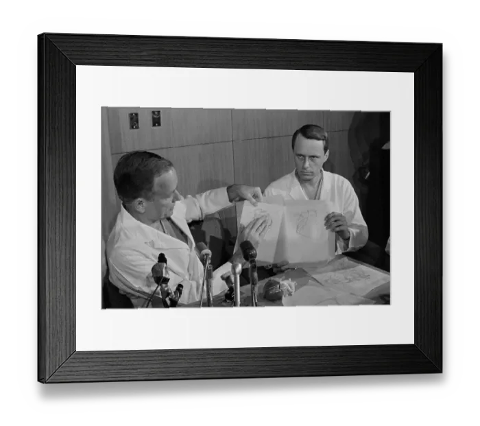 Framed Print : Doctors Show Heart Transplant Diagrams Framed Print : Doctors Show Heart Transplant Diagrams