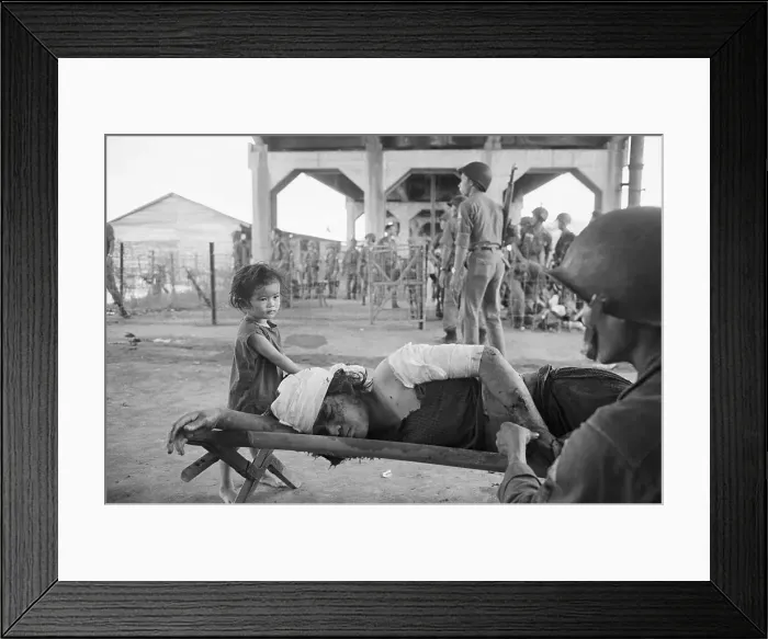 Framed Print : Vietnamese Child With Injured Mother Framed Print : Vietnamese Child With Injured Mother
