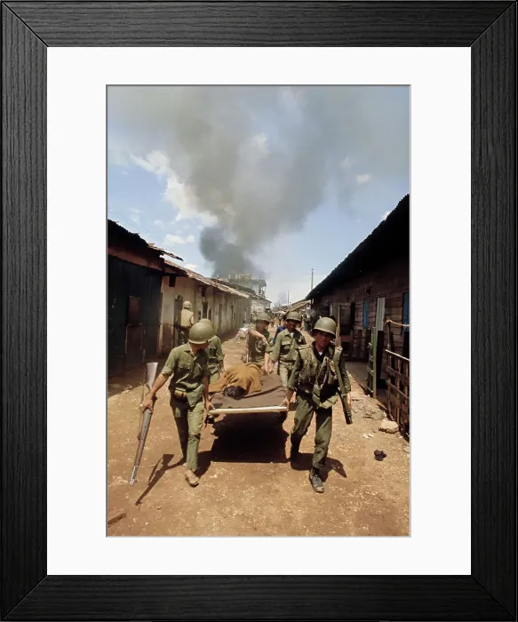 Framed Print : Soldiers Transporting Wounded Civilian Framed Print : Soldiers Transporting Wounded Civilian