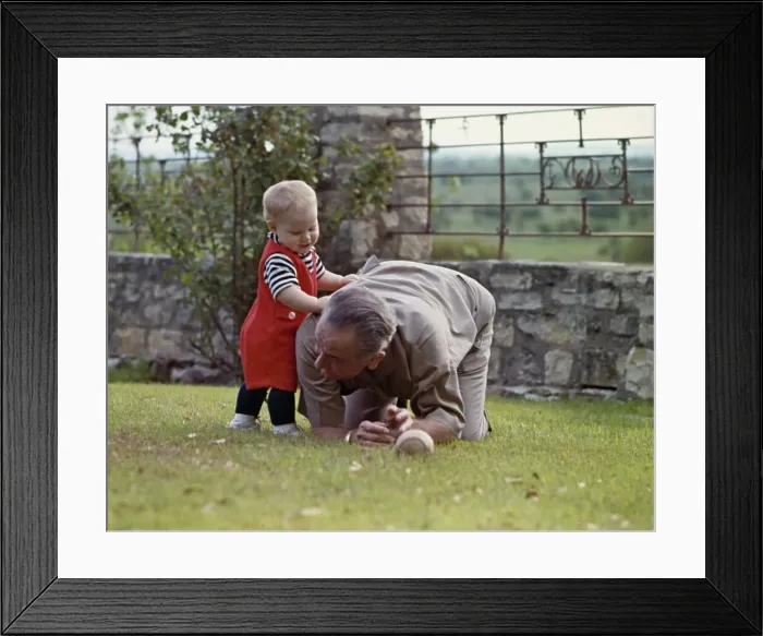 Framed Print : President Johnson Playing With Grandson Framed Print : President Johnson Playing With Grandson