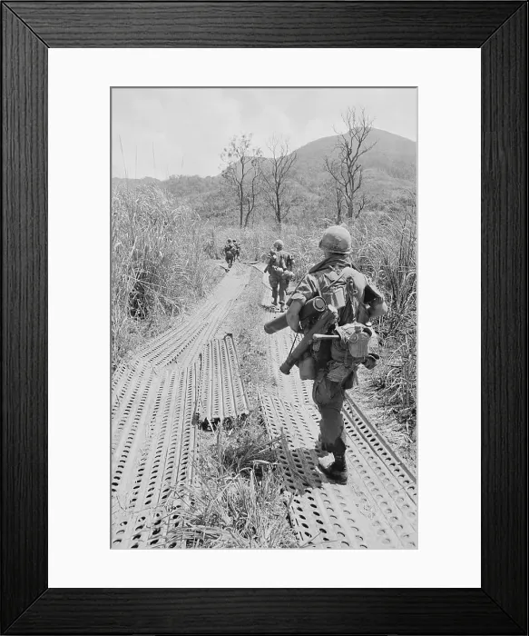 Framed Print : American Troops Trekking Through Metal Strip Pathway Framed Print : American Troops Trekking Through Metal Strip Pathway