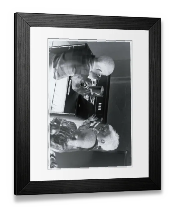 Framed Print : Children Huddling Around Stove for Heat Framed Print : Children Huddling Around Stove for Heat