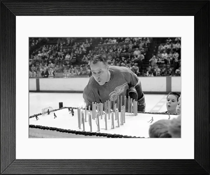 Framed Print : Gordie Howe Blowing Out Candles on Birthday Cake Framed Print : Gordie Howe Blowing Out Candles on Birthday Cake