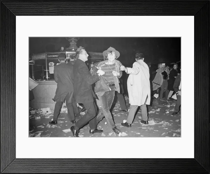 Framed Print : Detectives Drag Away Oddly-Dressed Man Framed Print : Detectives Drag Away Oddly-Dressed Man