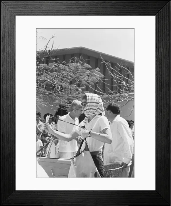 Framed Print : Jacqueline Kennedy with Slingshot on Flea Market Outing Framed Print : Jacqueline Kennedy with Slingshot on Flea Market Outing