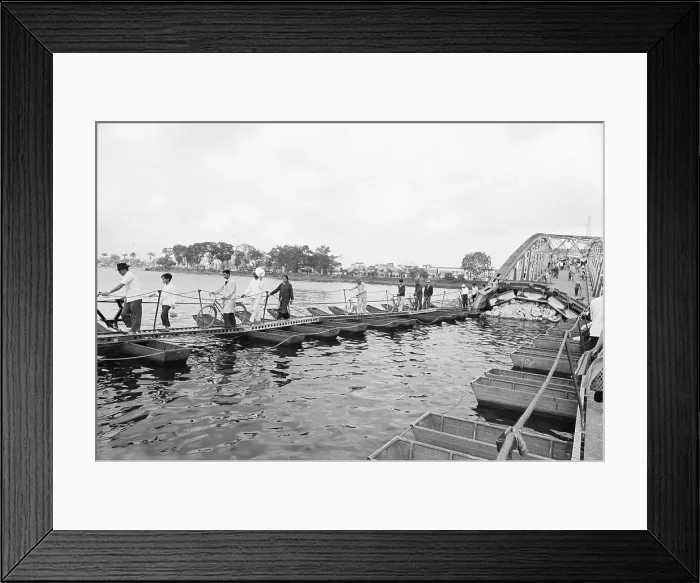 Framed Print : Residents Crossing Damaged Bridge Framed Print : Residents Crossing Damaged Bridge