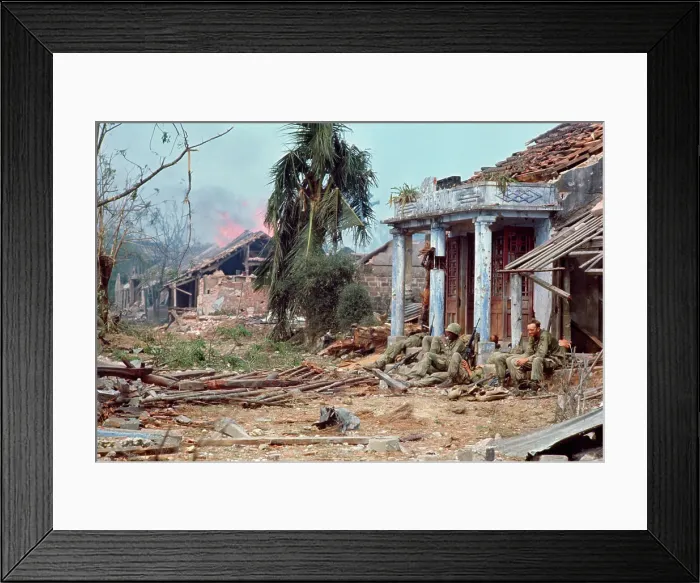 Framed Print : Soldiers Sitting in Front of a Damaged House