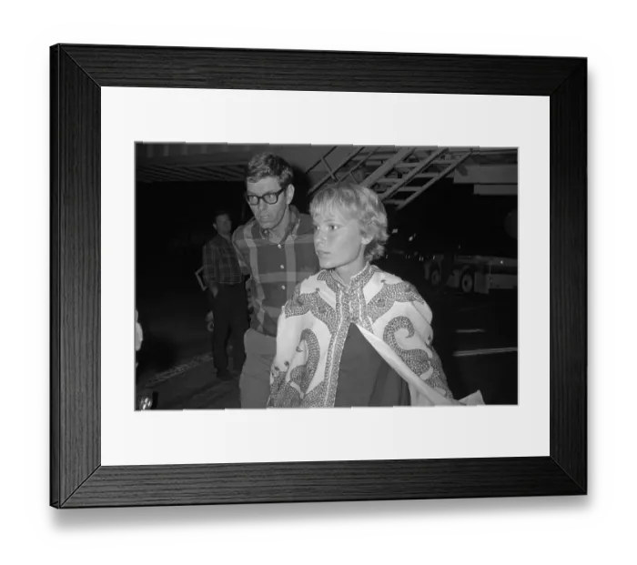 Framed Print : Mia Farrow Walking in Elaborate Outer Wear Framed Print : Mia Farrow Walking in Elaborate Outer Wear