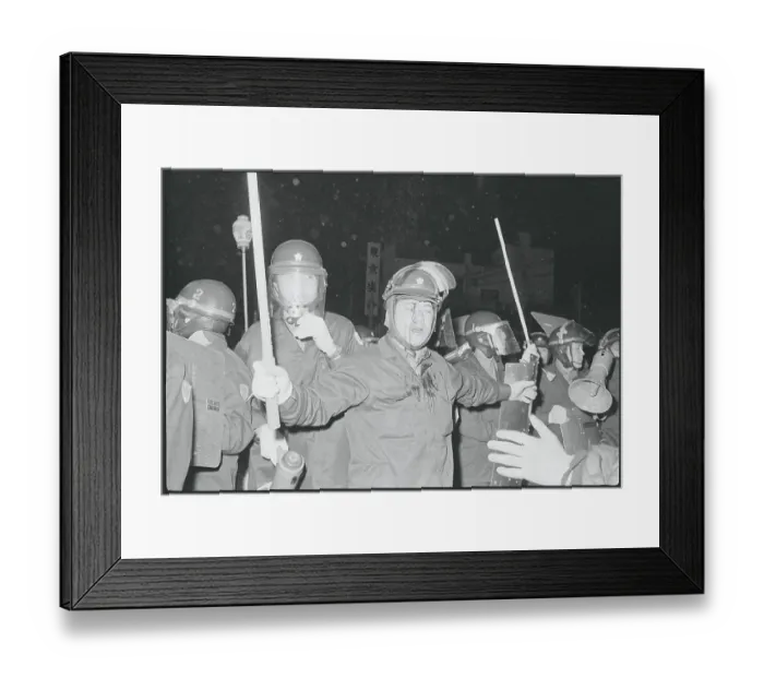 Framed Print : Policemen in Riot Gear Restraining Crowd Framed Print : Policemen in Riot Gear Restraining Crowd