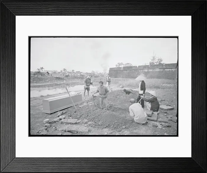 Framed Print : Family Watching Grave Diggers Framed Print : Family Watching Grave Diggers