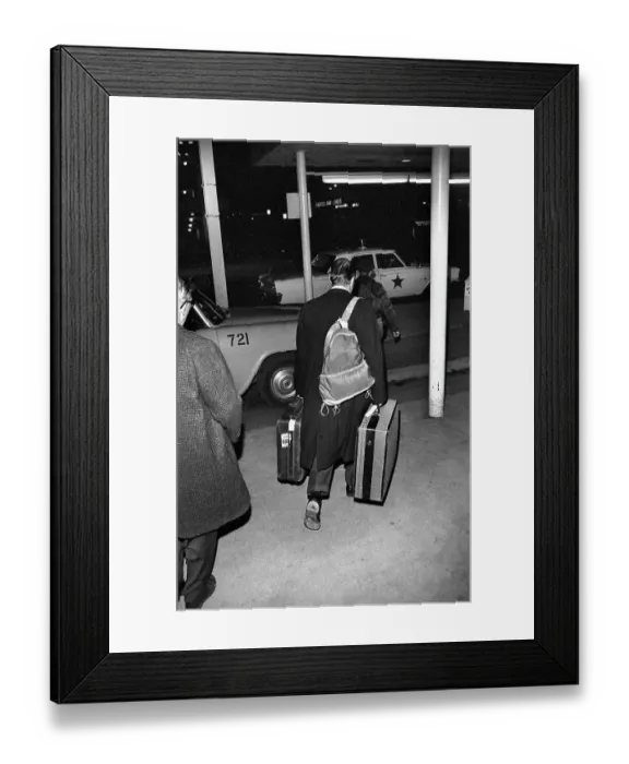 Framed Print : Robert McNamara Carrying Suitcases Framed Print : Robert McNamara Carrying Suitcases