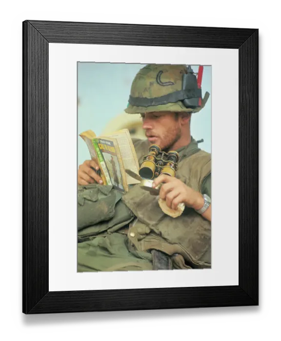 Framed Print : US Marine Reading Book Framed Print : US Marine Reading Book