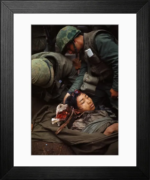 Framed Print : U.S. Marines Treating Wounded North Vietnamese Soldier Framed Print : U.S. Marines Treating Wounded North Vietnamese Soldier
