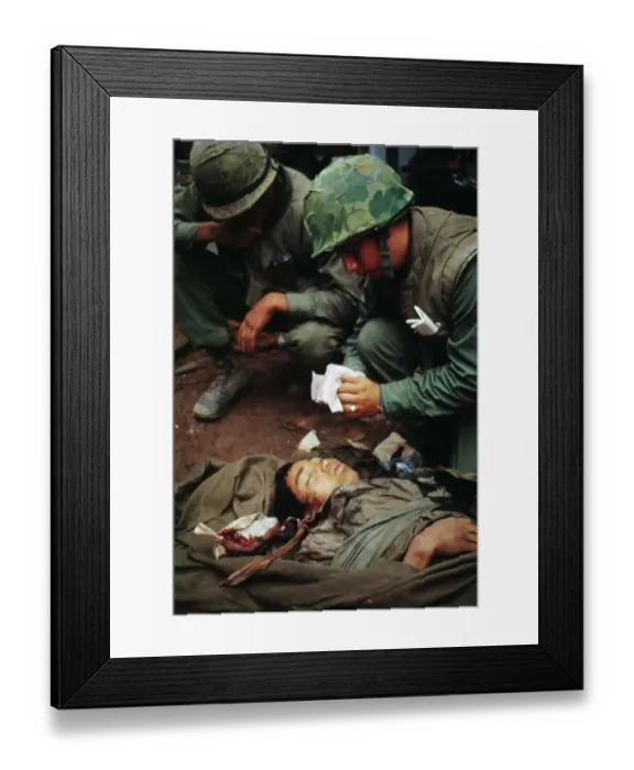Framed Print : U.S. Marines Treating Wounded North Vietnamese Soldier Framed Print : U.S. Marines Treating Wounded North Vietnamese Soldier