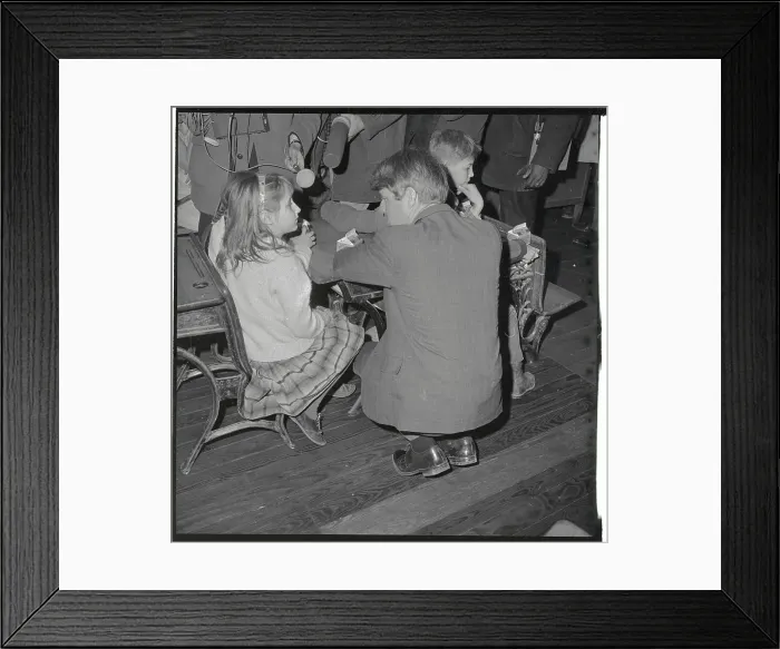 Framed Print : Senator Robert Kennedy Stooping to Talk with Young Girl Framed Print : Senator Robert Kennedy Stooping to Talk with Young Girl