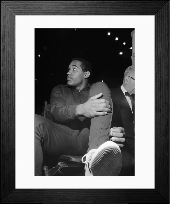 Framed Print : O.J. Simpson Adjusts His Pants Leg Framed Print : O.J. Simpson Adjusts His Pants Leg