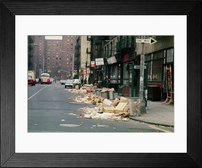 Framed Print : Piles of Garbage Lying on the Street Curb Framed Print : Piles of Garbage Lying on the Street Curb