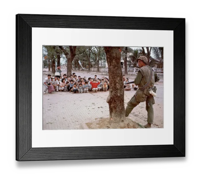 Framed Print : American Soldier Guards Refugees in Vietnam Framed Print : American Soldier Guards Refugees in Vietnam